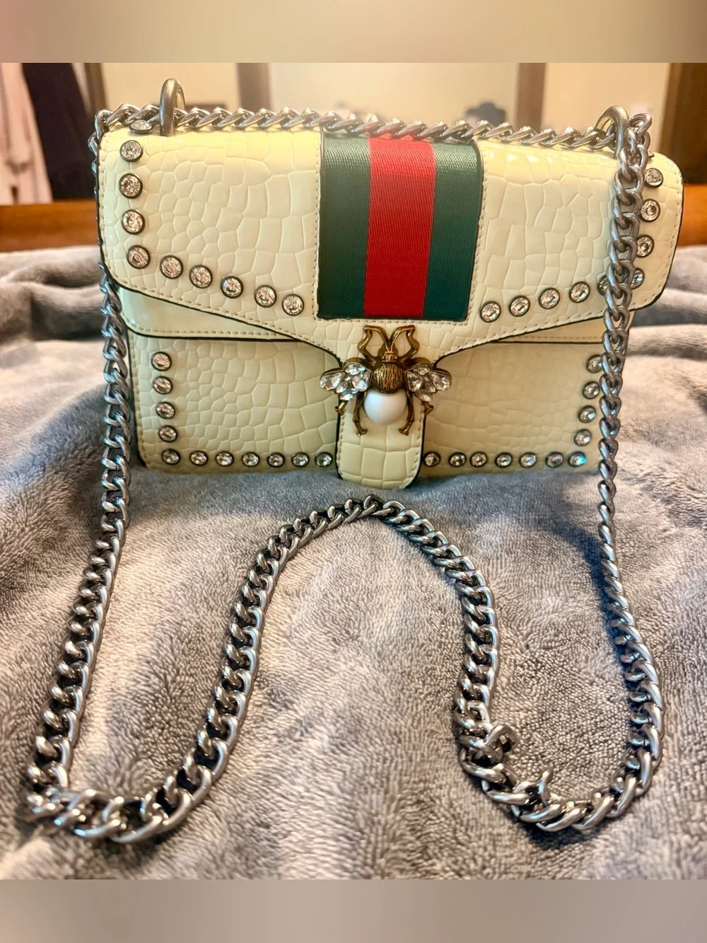 Cream Shoulder Bag with Green-Red Stripe and Decorative Bee Accent, Like New